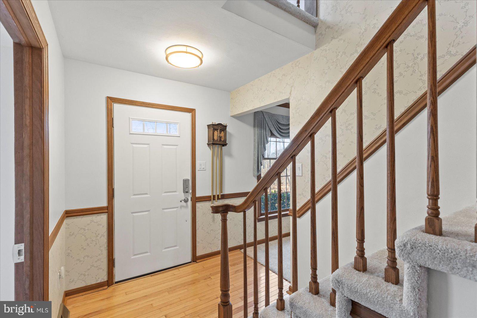 437 Valley View Drive Hanover, PA 17331 - Photo 4 of 40 a view of an entryway with wooden floor and door