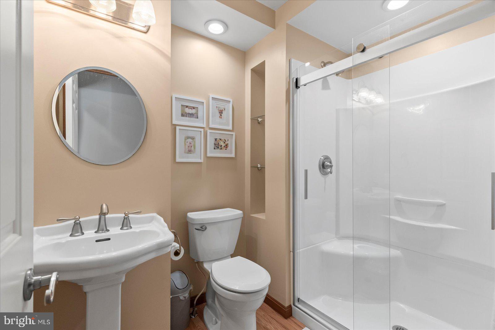 437 Valley View Drive Hanover, PA 17331 - Photo 7 of 40 a bathroom with a toilet sink and a mirror