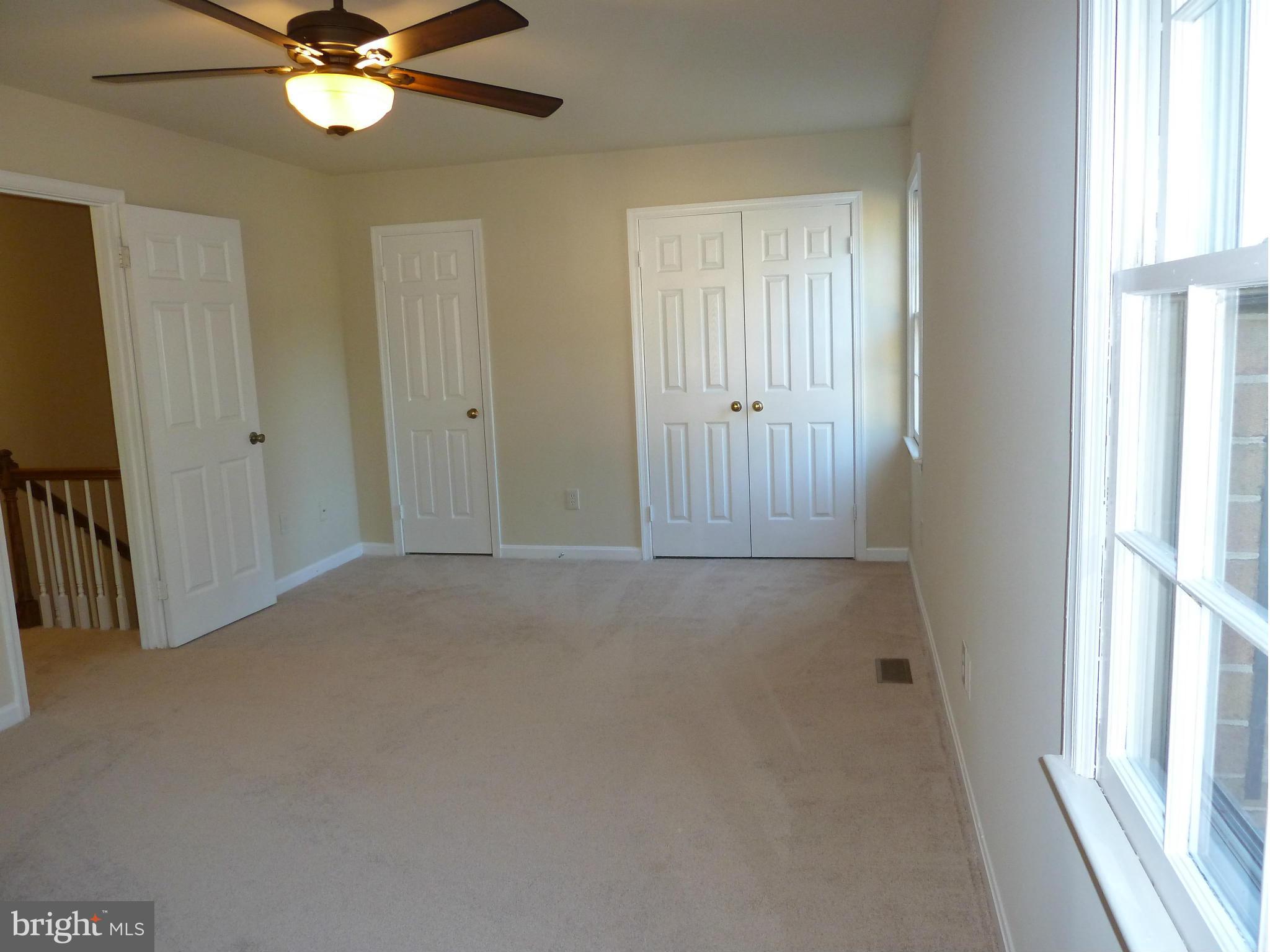 1016 Windrush Lane, Unit 25 Sandy Spring, MD 20860 - Photo 15 of 30 Ceiling Fan & full wall of closet space.