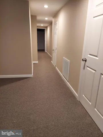 a view of a room with an empty space