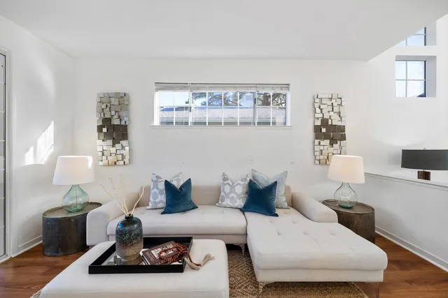 a living room with furniture and a couch