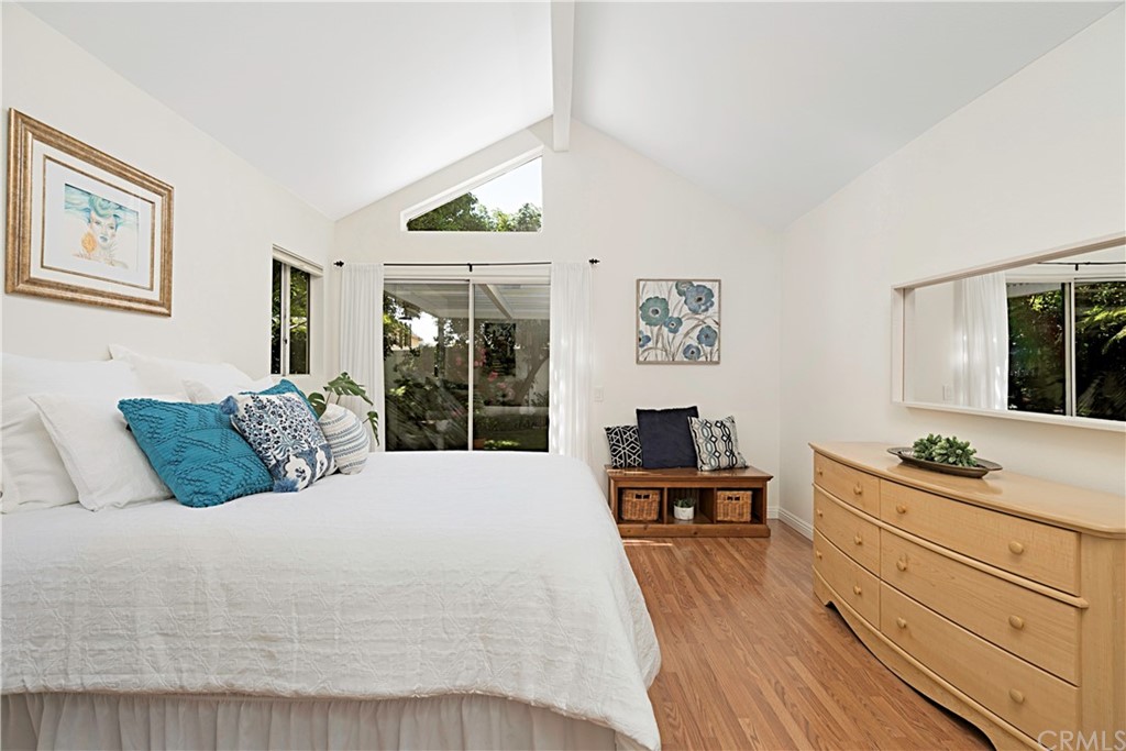 809 Canyon Wash Drive Pasadena, CA 91107 - Photo 11 of 17 a large bedroom with a bed and wooden floor