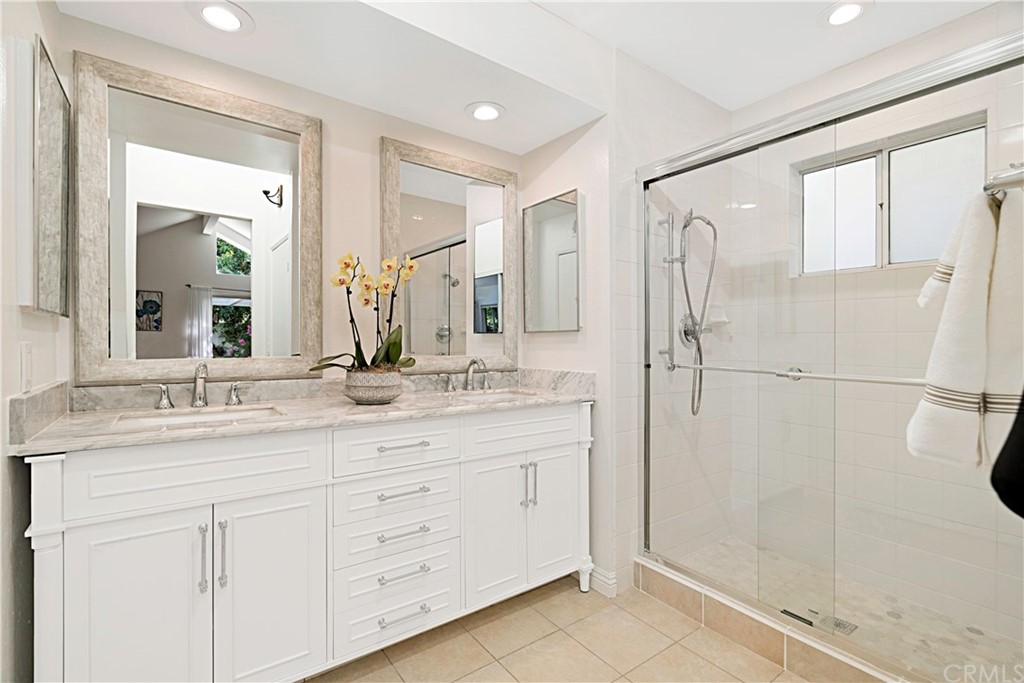 809 Canyon Wash Drive Pasadena, CA 91107 - Photo 12 of 17 a bathroom with a granite countertop sink mirror and double