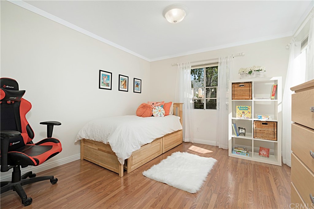 809 Canyon Wash Drive Pasadena, CA 91107 - Photo 13 of 17 a bedroom with a bed and wooden floor