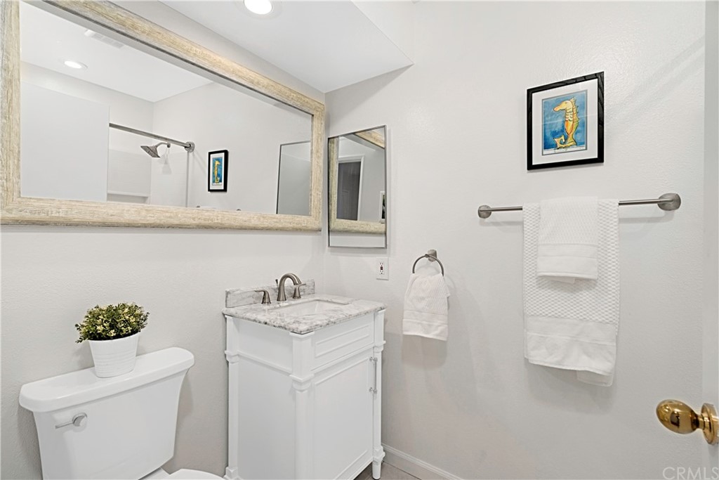 809 Canyon Wash Drive Pasadena, CA 91107 - Photo 15 of 17 a bathroom with a toilet sink and mirror
