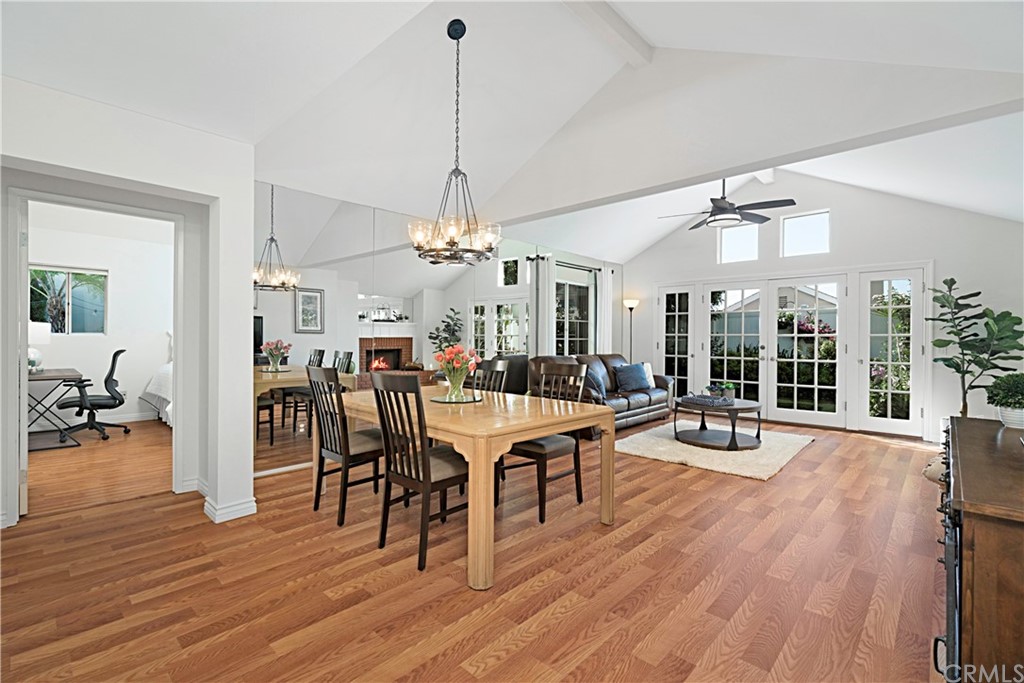 809 Canyon Wash Drive Pasadena, CA 91107 - Photo 4 of 17 a view of a dining room and livingroom with furniture wooden floor a chandelier