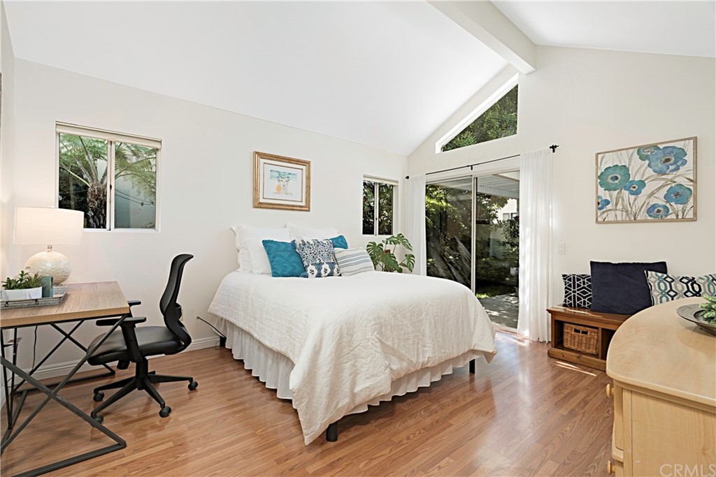 809 Canyon Wash Drive Pasadena, CA 91107 - Photo 10 of 17 a bedroom with a bed a table and chair