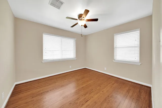 a view of houses with outdoor space and garden