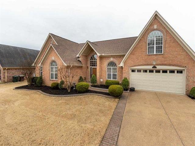 4939 Duck River Road Bartlett, TN 38135 - Photo 1 of 1 a view of a house with a yard and potted plants