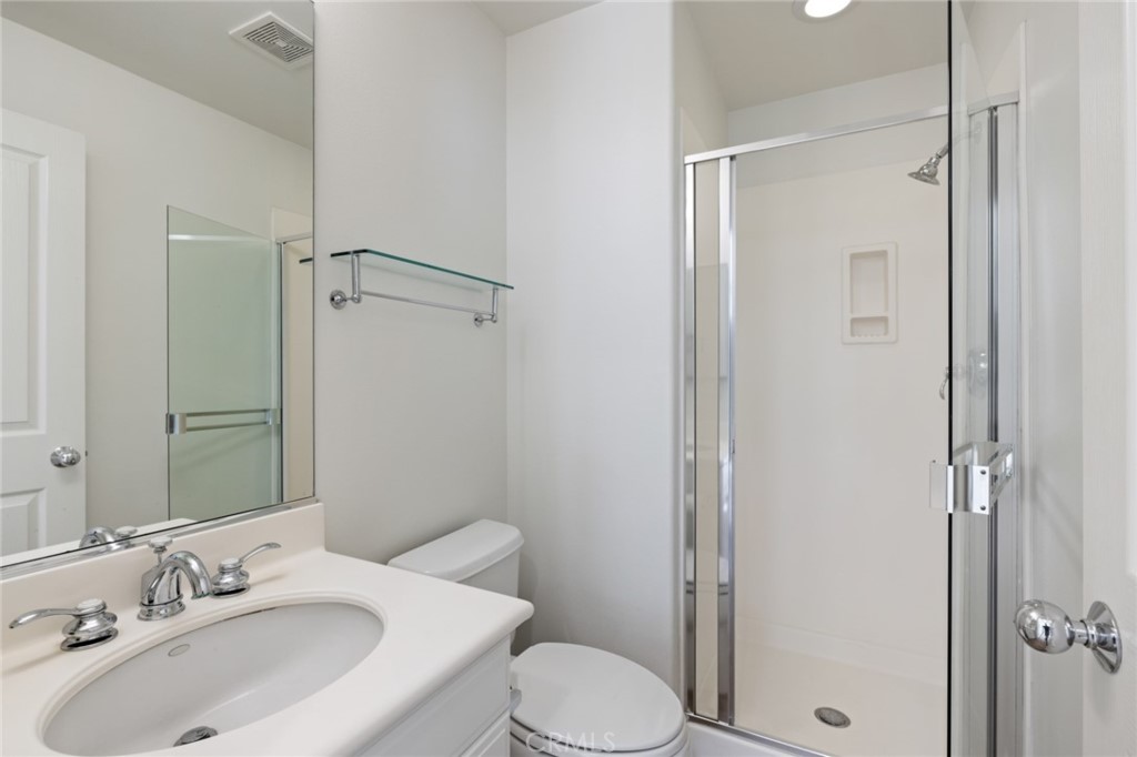 119 White Flower Irvine, CA 92603 - Photo 11 of 38 a bathroom with a sink toilet and shower