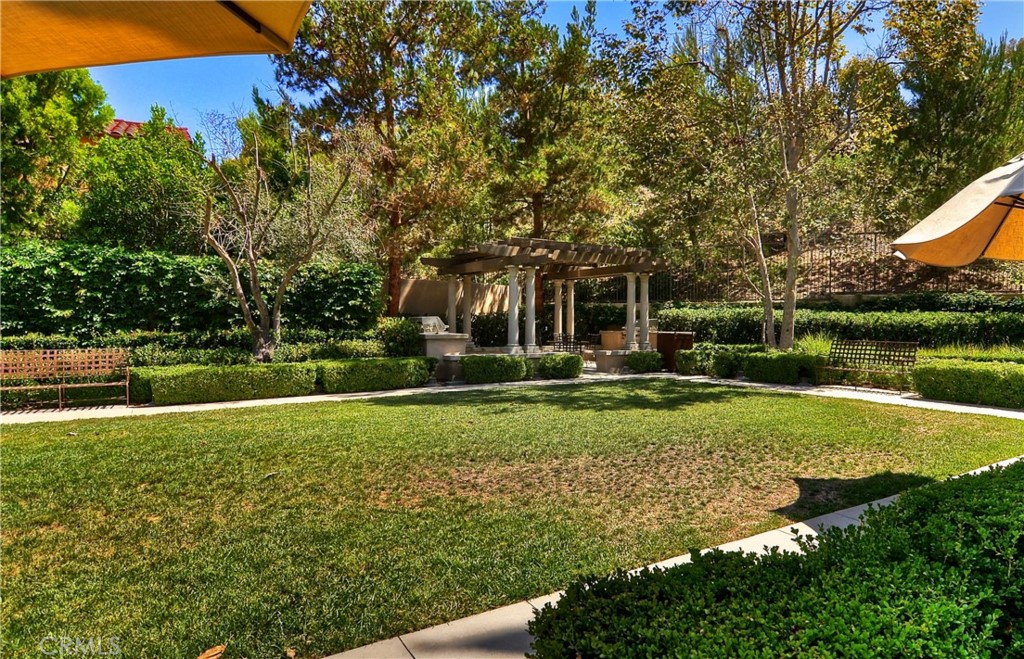 119 White Flower Irvine, CA 92603 - Photo 27 of 38 a view of a house with a yard