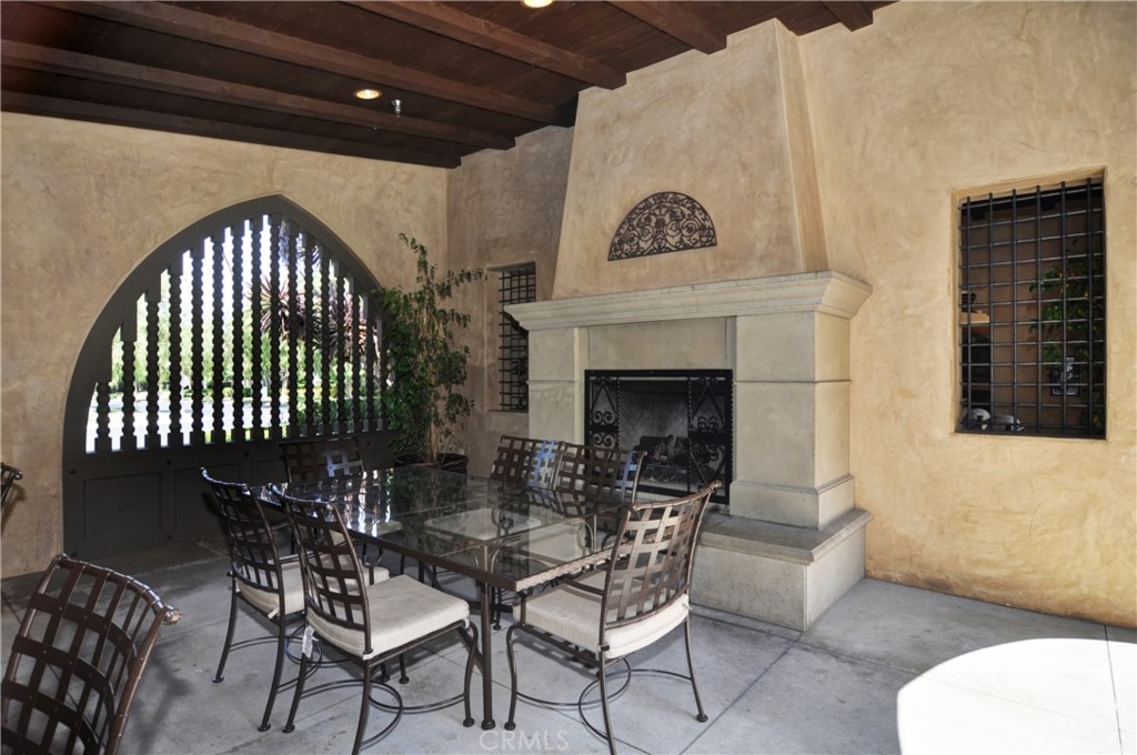 119 White Flower Irvine, CA 92603 - Photo 29 of 38 a view of a livingroom with furniture and a floor to ceiling window
