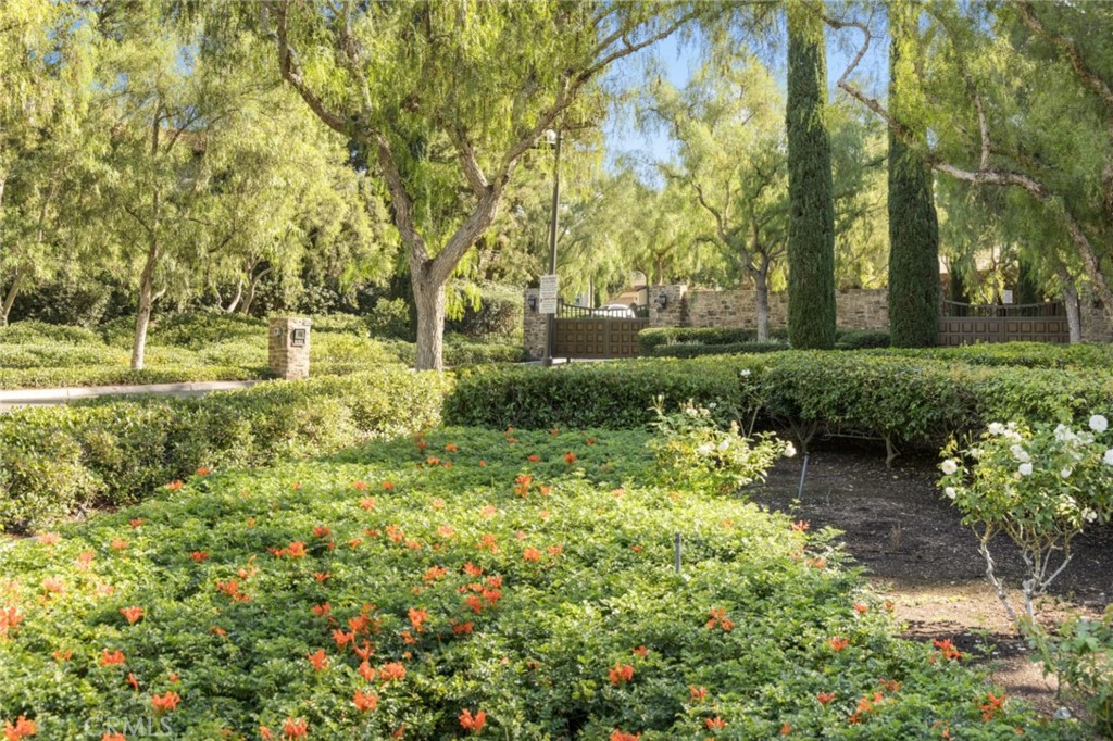 119 White Flower Irvine, CA 92603 - Photo 36 of 38 a view of a garden with large trees