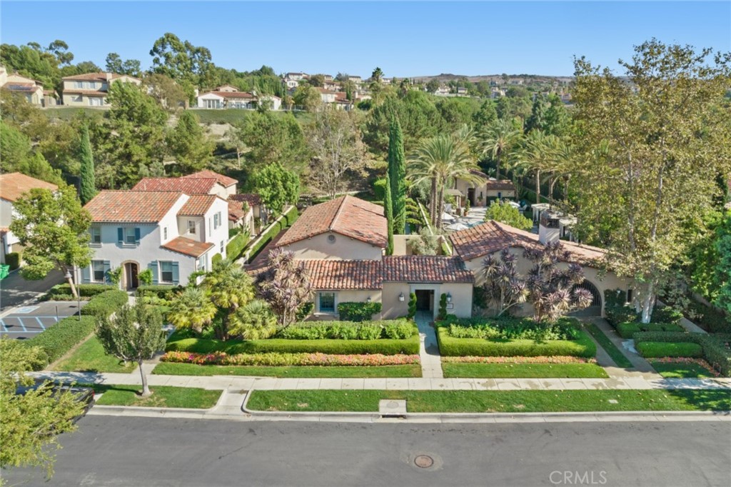 119 White Flower Irvine, CA 92603 - Photo 4 of 38 a aerial view of a house with a yard and potted plants