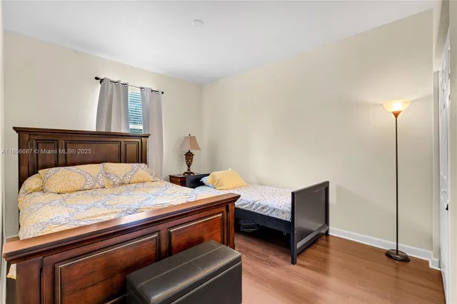 a work room with furniture and wooden floor