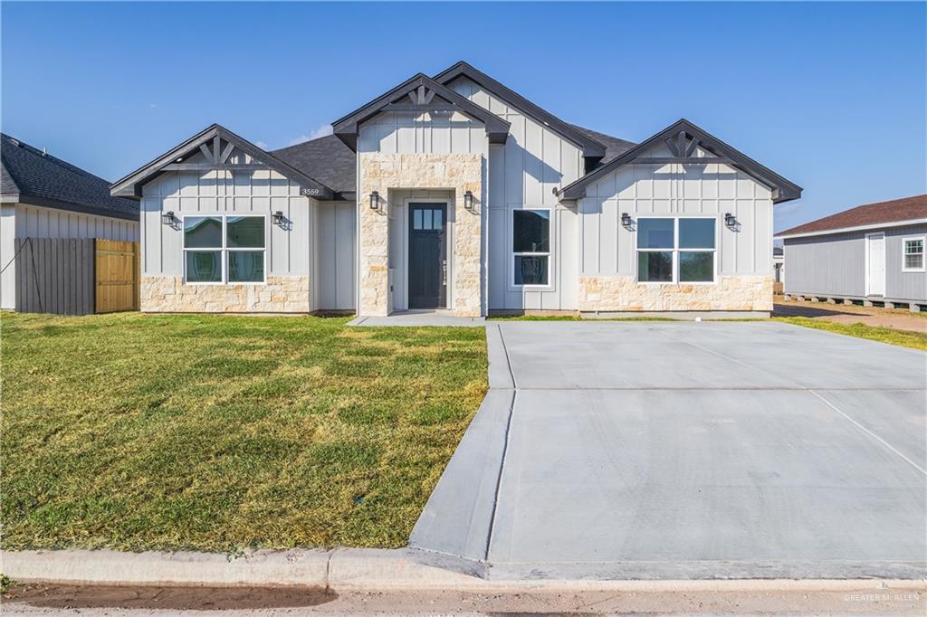 3559 Satelite Street Edinburg, TX 78542 - Photo 1 of 22 a front view of a house with a yard