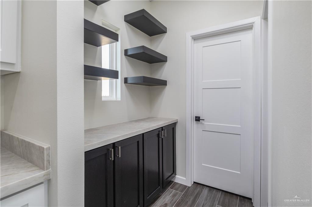 3559 Satelite Street Edinburg, TX 78542 - Photo 7 of 22 a view of walk in closet with clothes