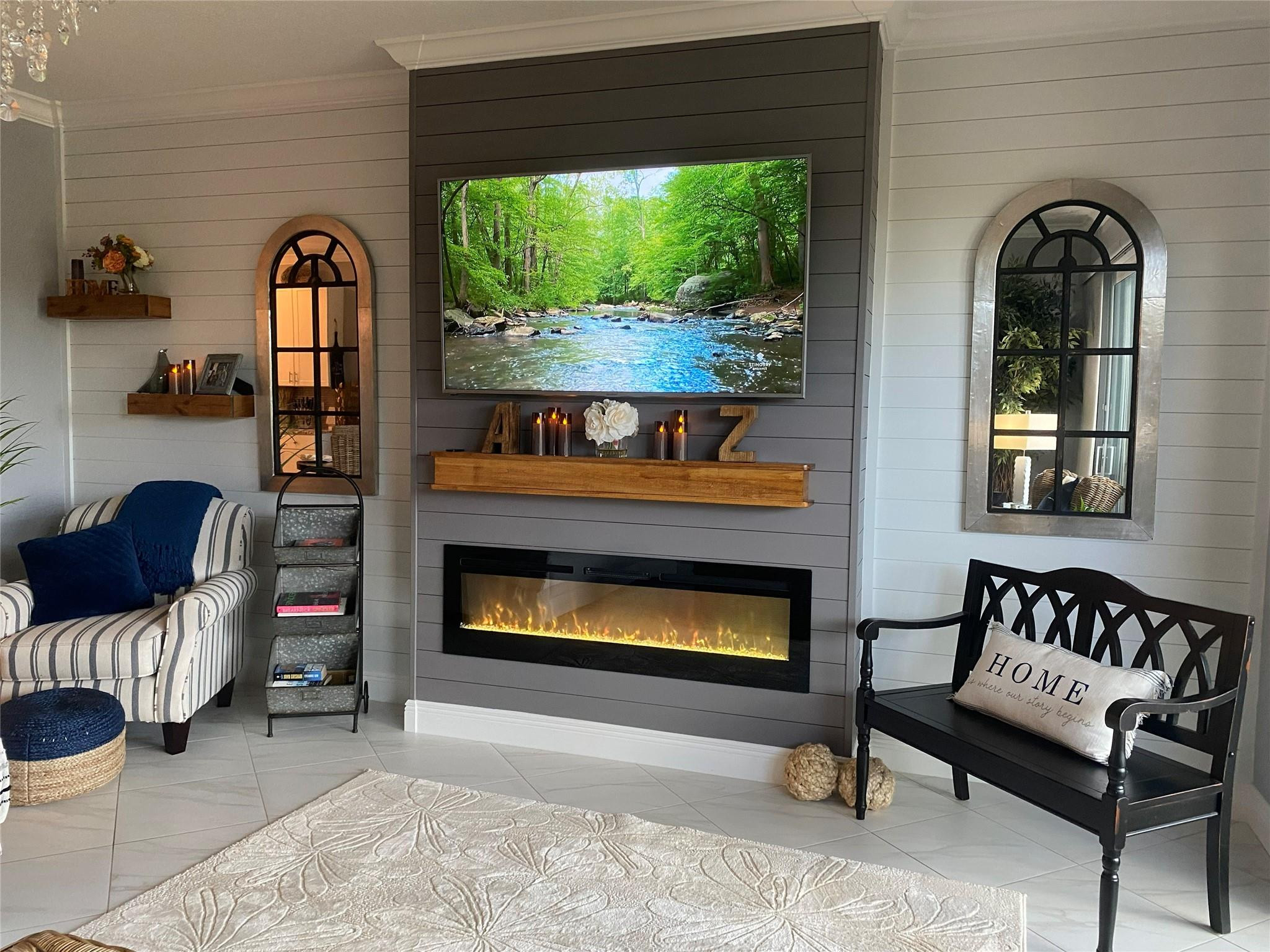 651 Southwest Glen Crest Way, Unit 2 Stuart, FL 34997 - Photo 12 of 41 a living room with furniture and a fireplace