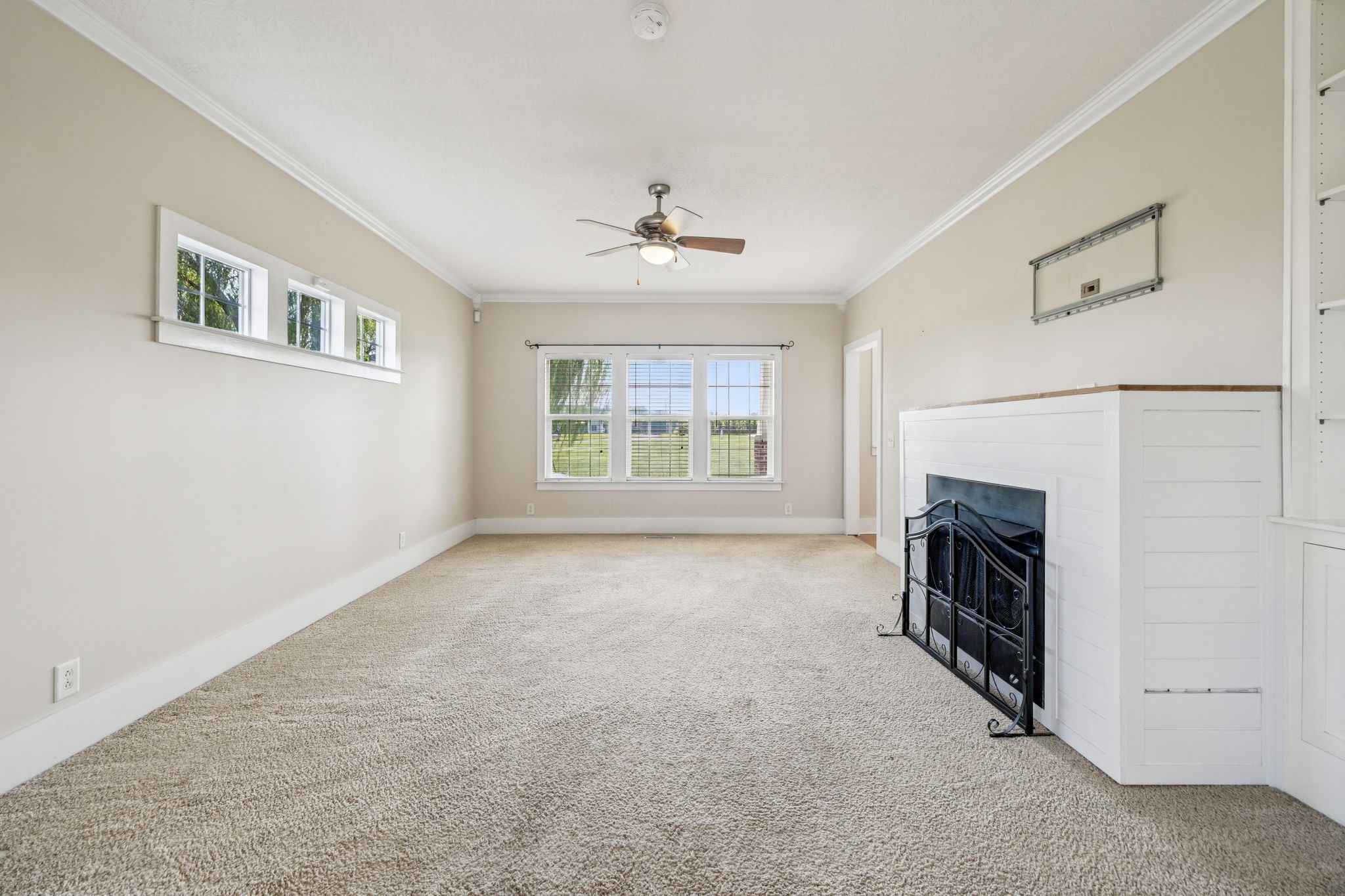 572 Buntin Mill Road Cottontown, TN 37048 - Photo 19 of 67 an empty room with windows and fireplace