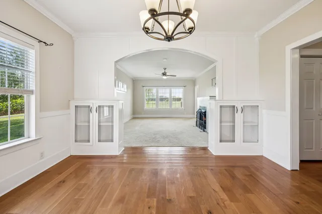 a view of entryway with wooden floor