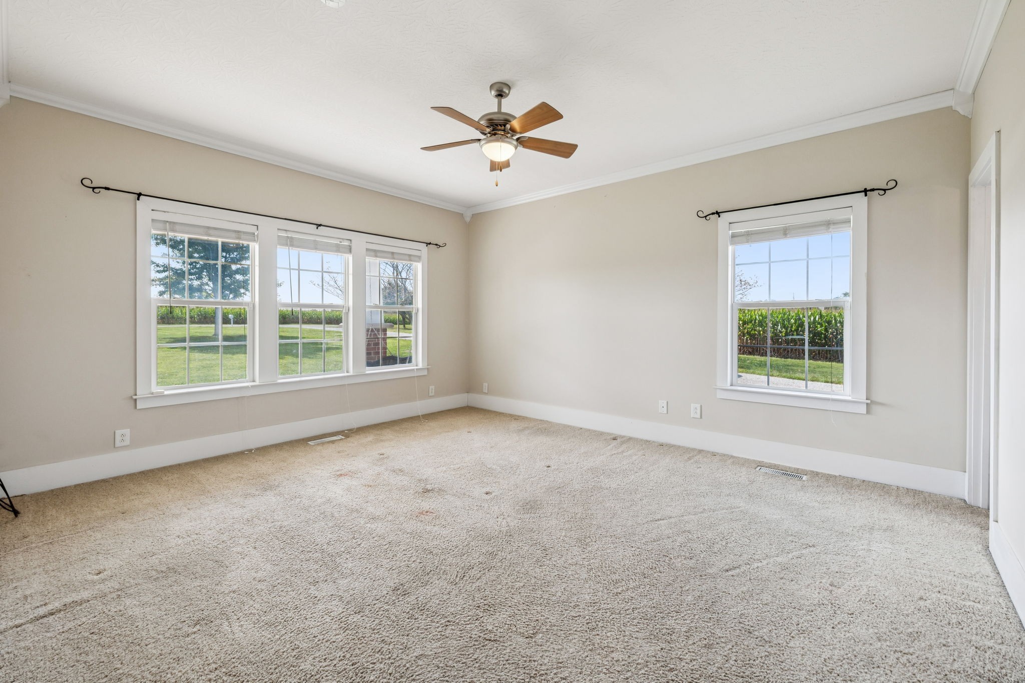 572 Buntin Mill Road Cottontown, TN 37048 - Photo 35 of 67 a view of a livingroom with a ceiling fan and window