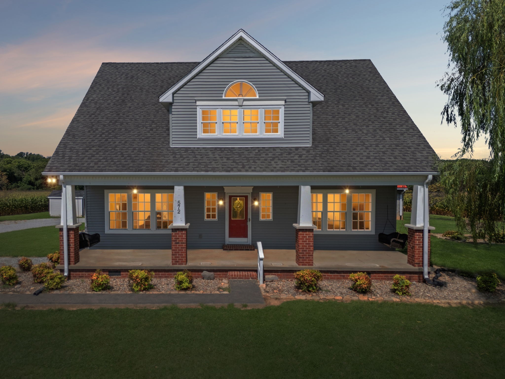572 Buntin Mill Road Cottontown, TN 37048 - Photo 5 of 67 a front view of a house with a yard