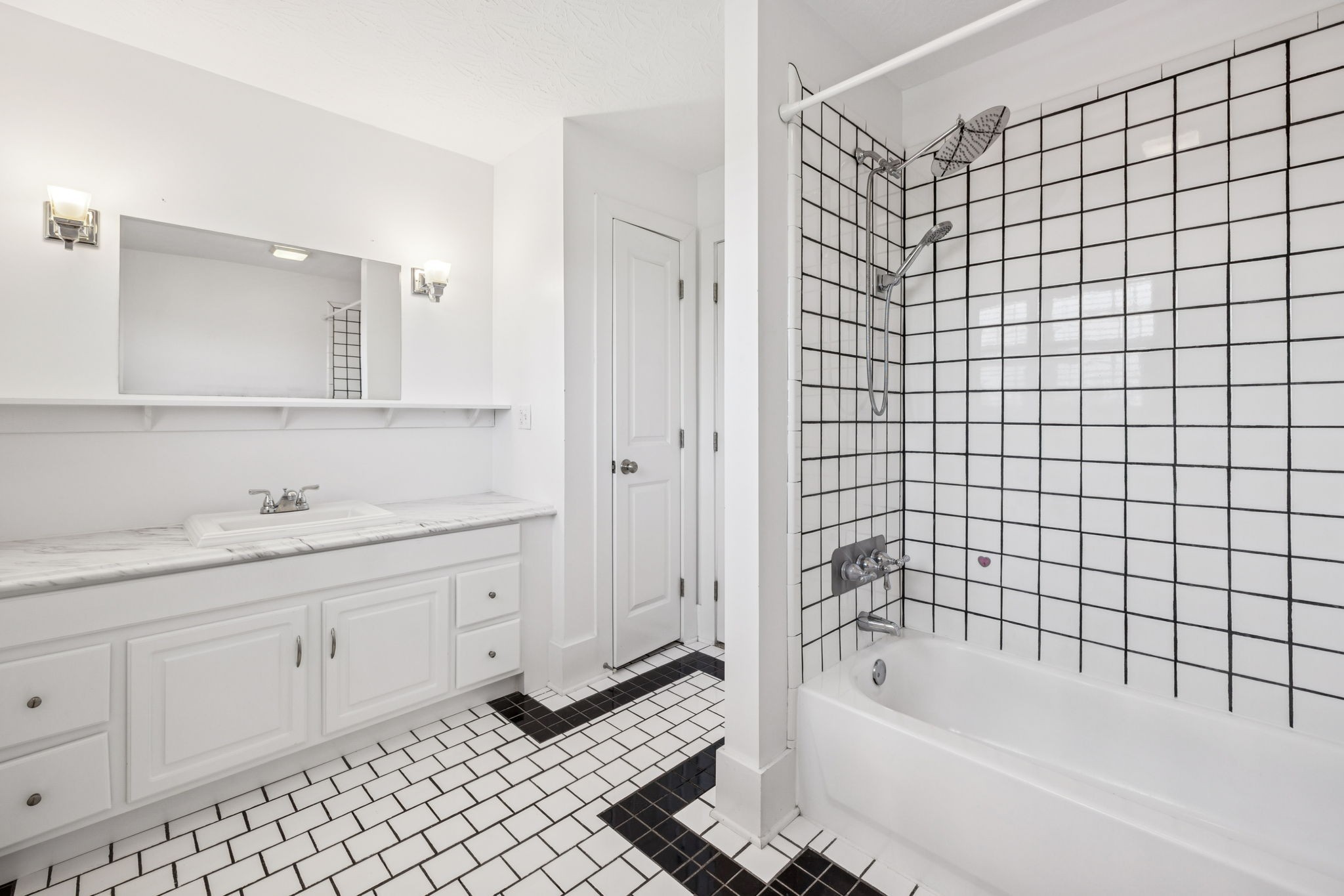 572 Buntin Mill Road Cottontown, TN 37048 - Photo 52 of 67 a bathroom with a bathtub and a sink