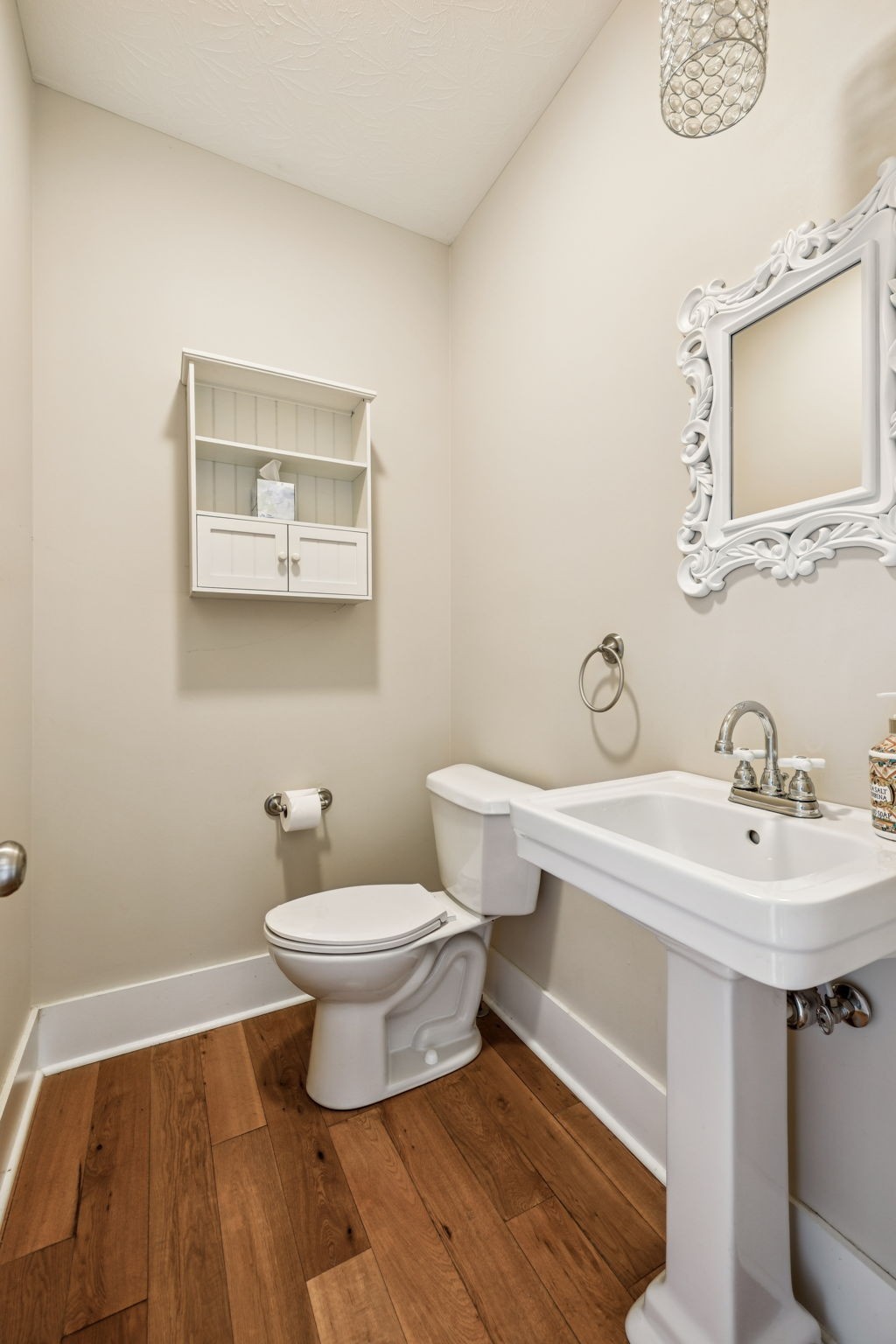 572 Buntin Mill Road Cottontown, TN 37048 - Photo 55 of 67 a bathroom with a toilet a sink and mirror