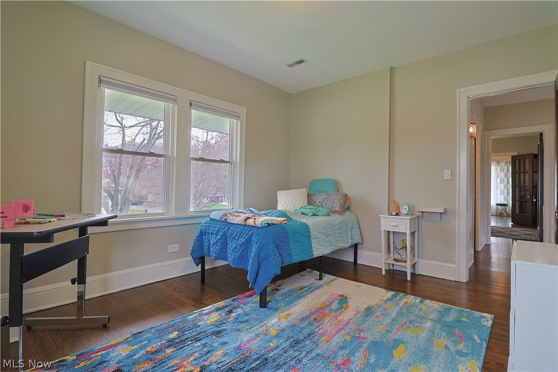 4376 Dover Center Road North Olmsted, OH 44070 - Photo 21 of 34 Bedroom with dark hardwood / wood-style floors