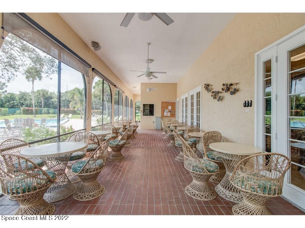 9640 Estuary Way, Unit 3 Sebastian, FL 32958 - Photo 19 of 24 a living room with furniture and a large window