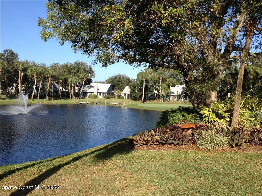 9640 Estuary Way, Unit 3 Sebastian, FL 32958 - Photo 23 of 24 a view of a lake with houses