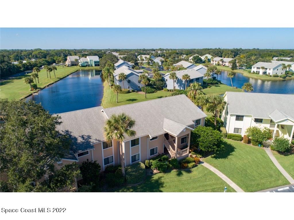 9640 Estuary Way, Unit 3 Sebastian, FL 32958 - Photo 3 of 24 an aerial view of residential houses with outdoor space and river