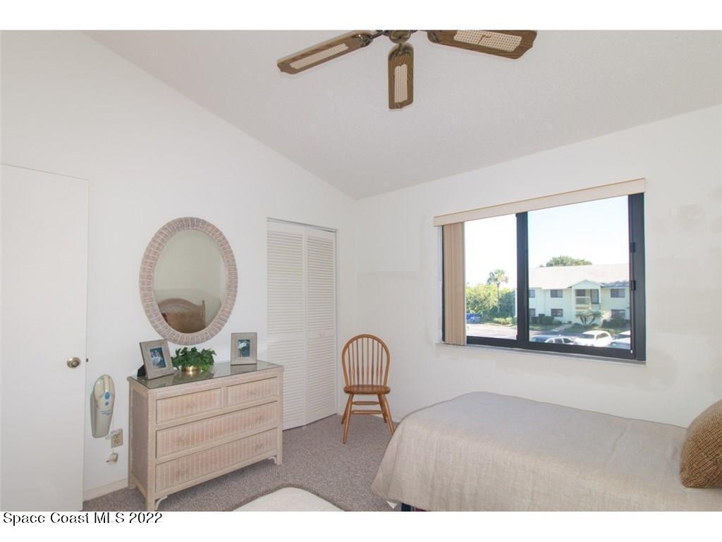 9640 Estuary Way, Unit 3 Sebastian, FL 32958 - Photo 5 of 24 a living room with furniture and a window