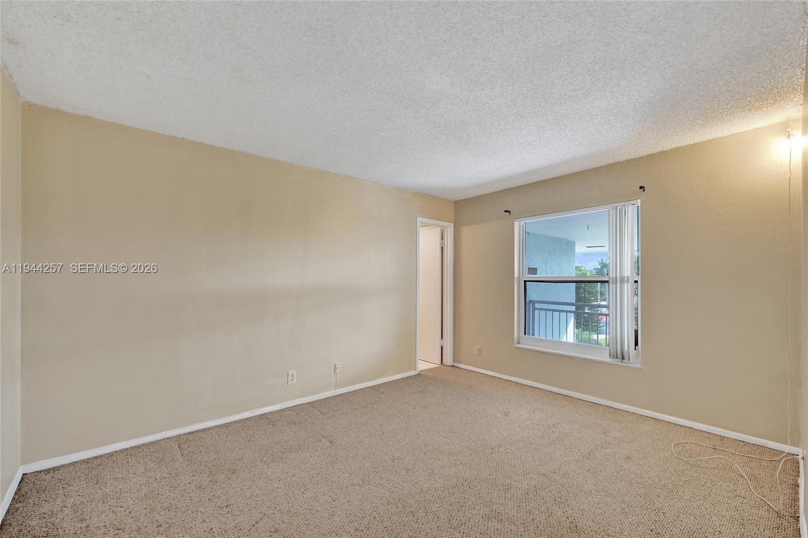 505 South Pine Island Road, Unit 405B Plantation, FL 33324 - Photo 20 of 43 a view of an empty room with a window