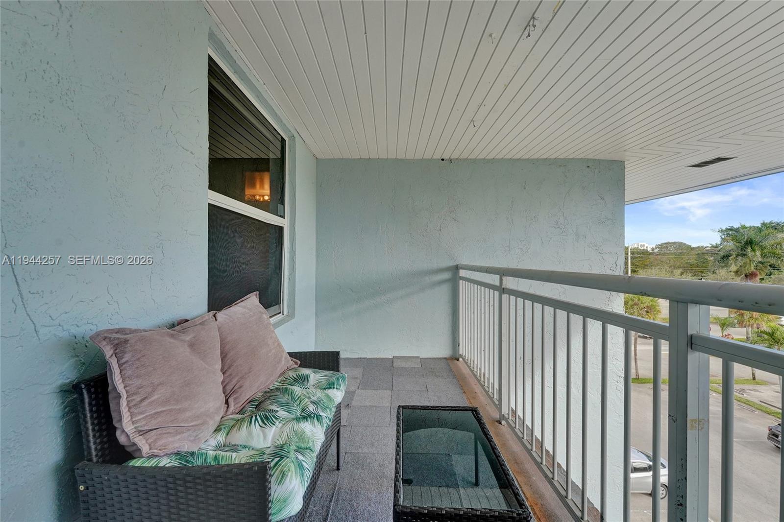 505 South Pine Island Road, Unit 405B Plantation, FL 33324 - Photo 24 of 43 a living room with furniture and a window