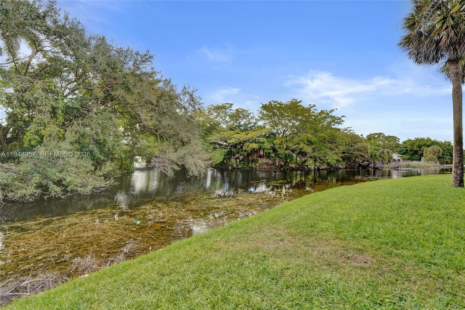 505 South Pine Island Road, Unit 405B Plantation, FL 33324 - Photo 31 of 43 a view of lake background with houses