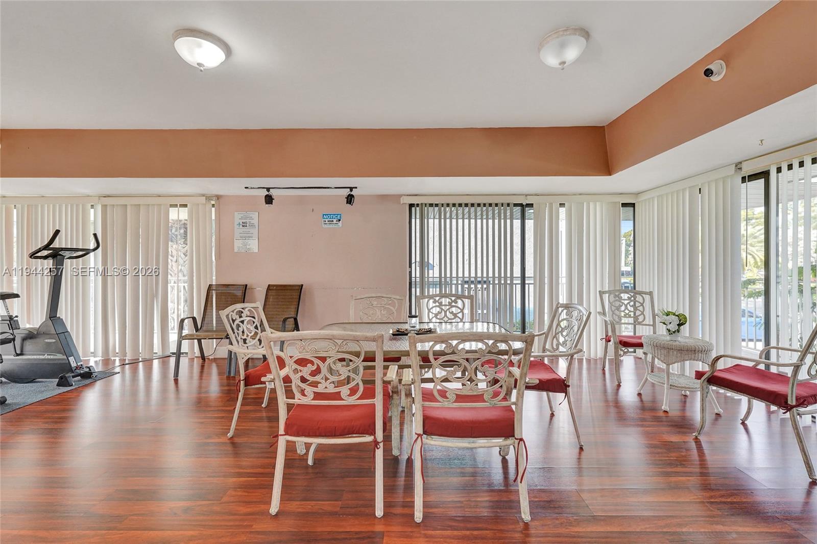 505 South Pine Island Road, Unit 405B Plantation, FL 33324 - Photo 36 of 43 a view of a a dining room with furniture window and wooden floor
