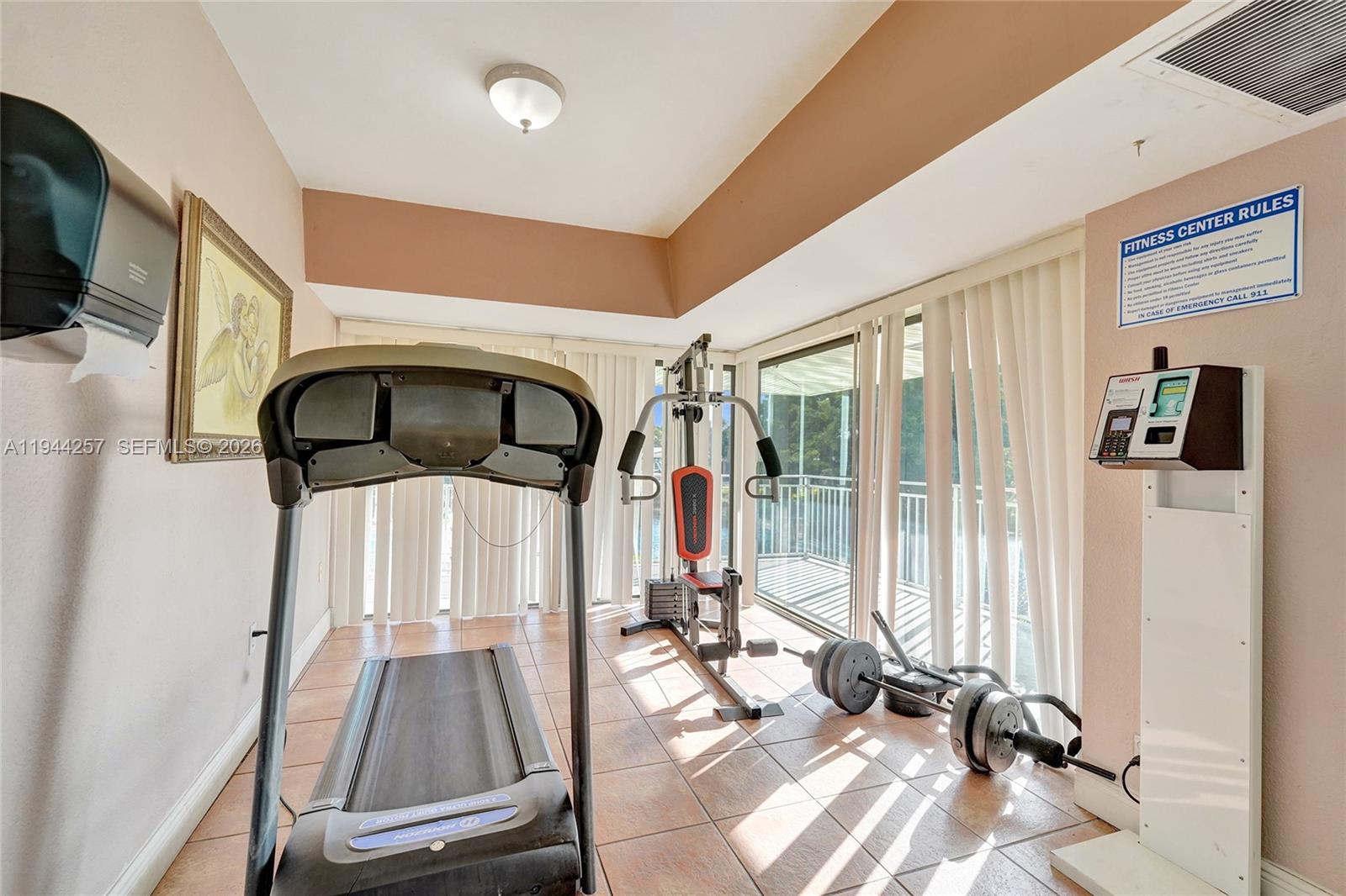 505 South Pine Island Road, Unit 405B Plantation, FL 33324 - Photo 38 of 43 a view of gym equipment and windows