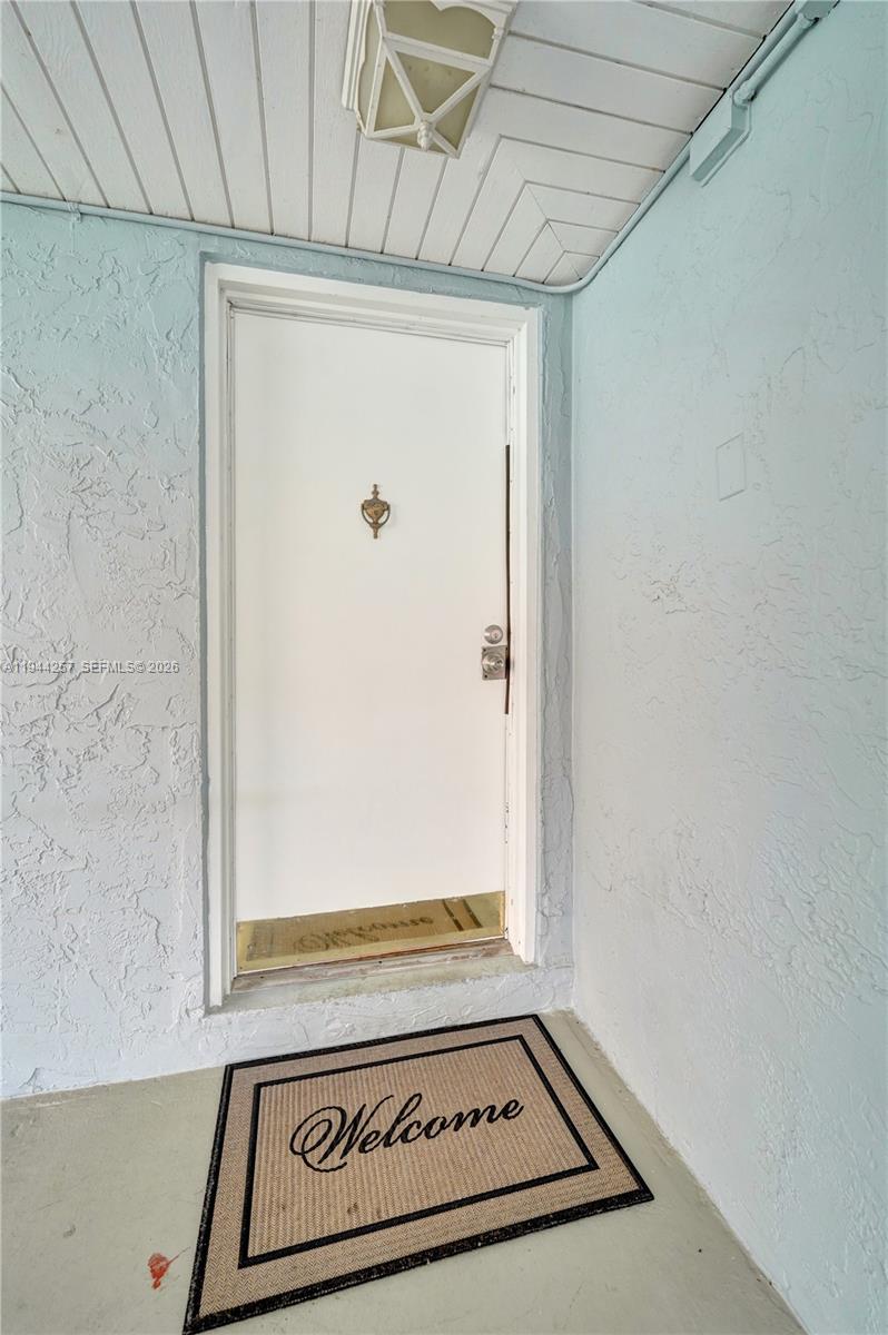 505 South Pine Island Road, Unit 405B Plantation, FL 33324 - Photo 8 of 43 a view of a door and a window