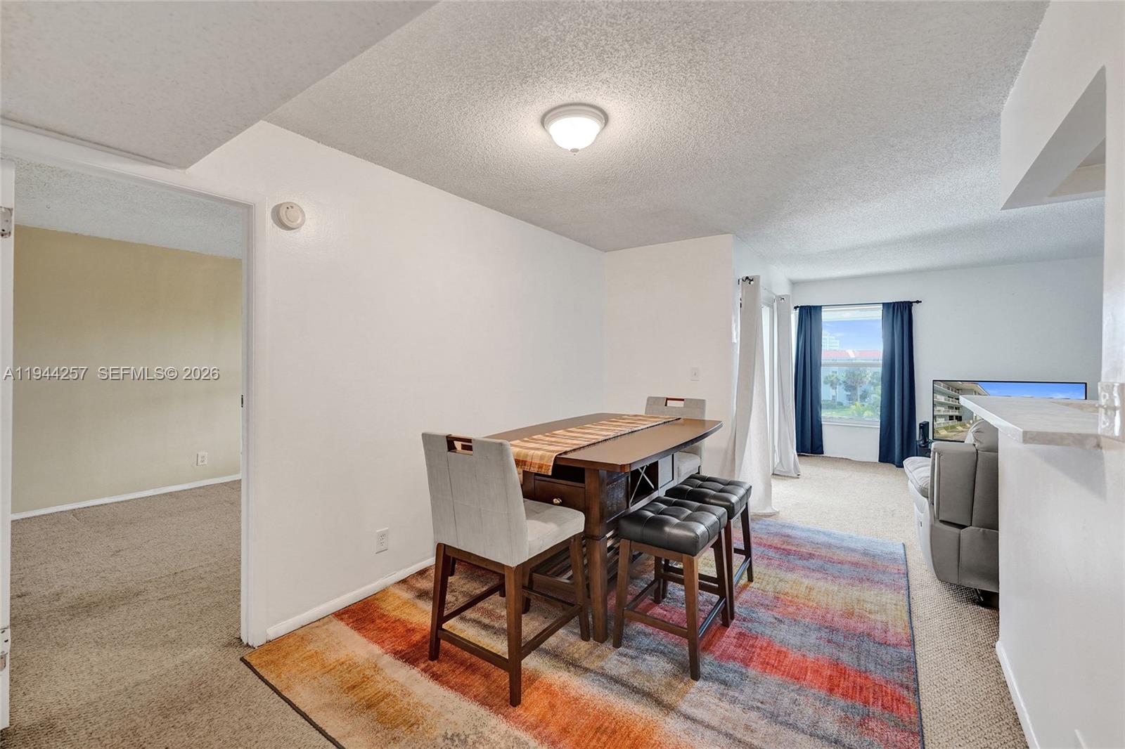505 South Pine Island Road, Unit 405B Plantation, FL 33324 - Photo 9 of 43 a workspace room with furniture and window
