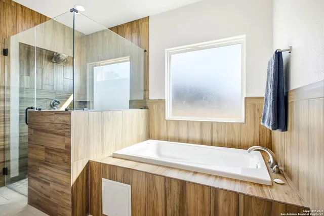 a bathroom with a sink and a shower