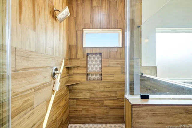 a view of a kitchen from a hallway