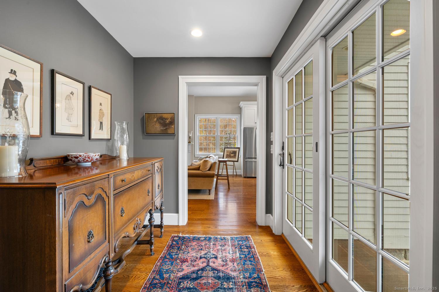 138 School House Road Old Saybrook, CT 06475 - Photo 19 of 40 a view of a kitchen with fridge and wooden floor