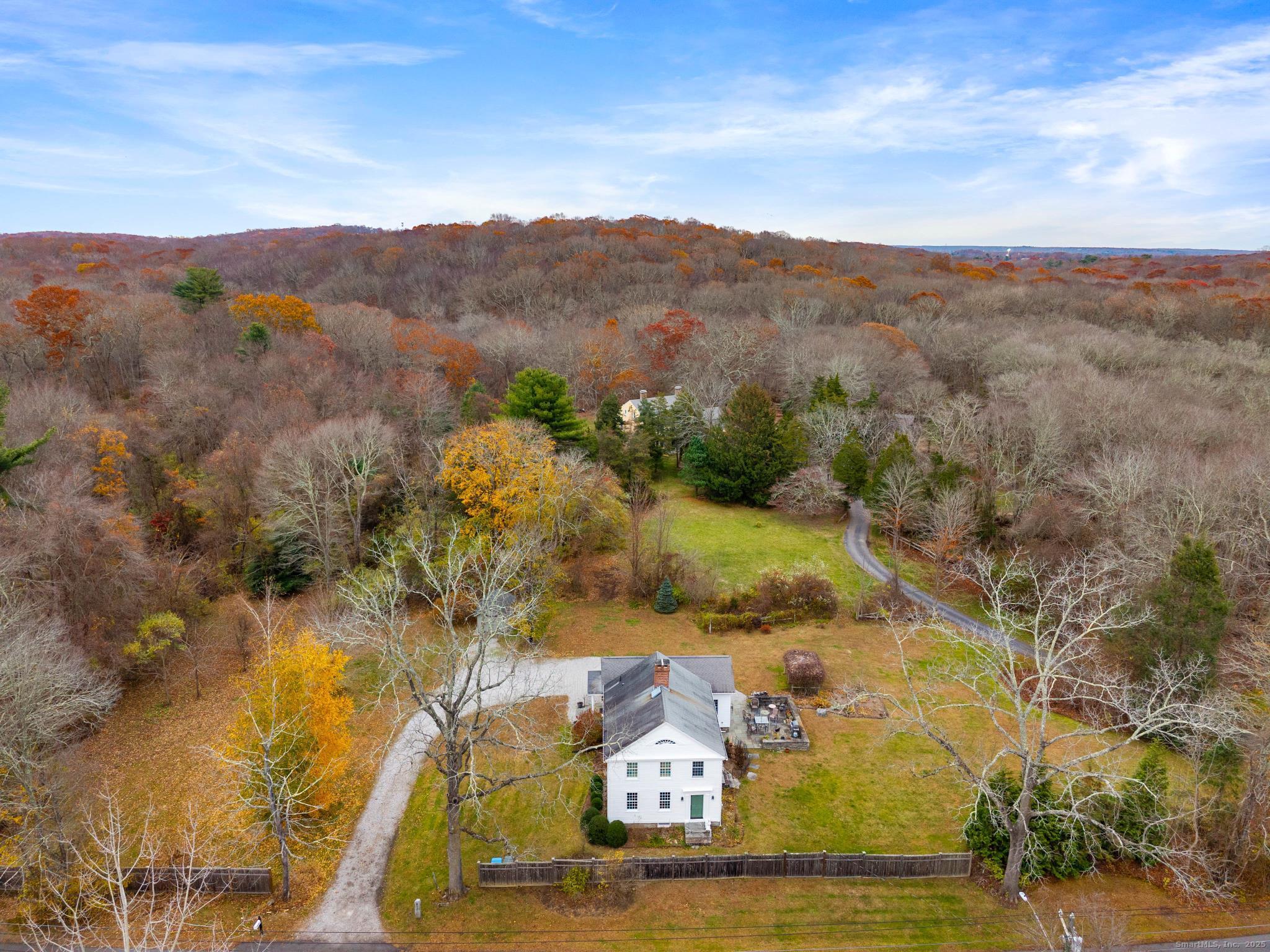 138 School House Road Old Saybrook, CT 06475 - Photo 2 of 40 a view of a town with mountains in the background
