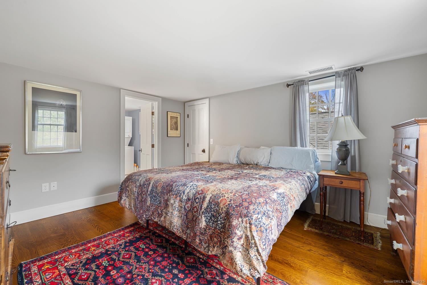 138 School House Road Old Saybrook, CT 06475 - Photo 31 of 40 a bedroom with a bed and a window