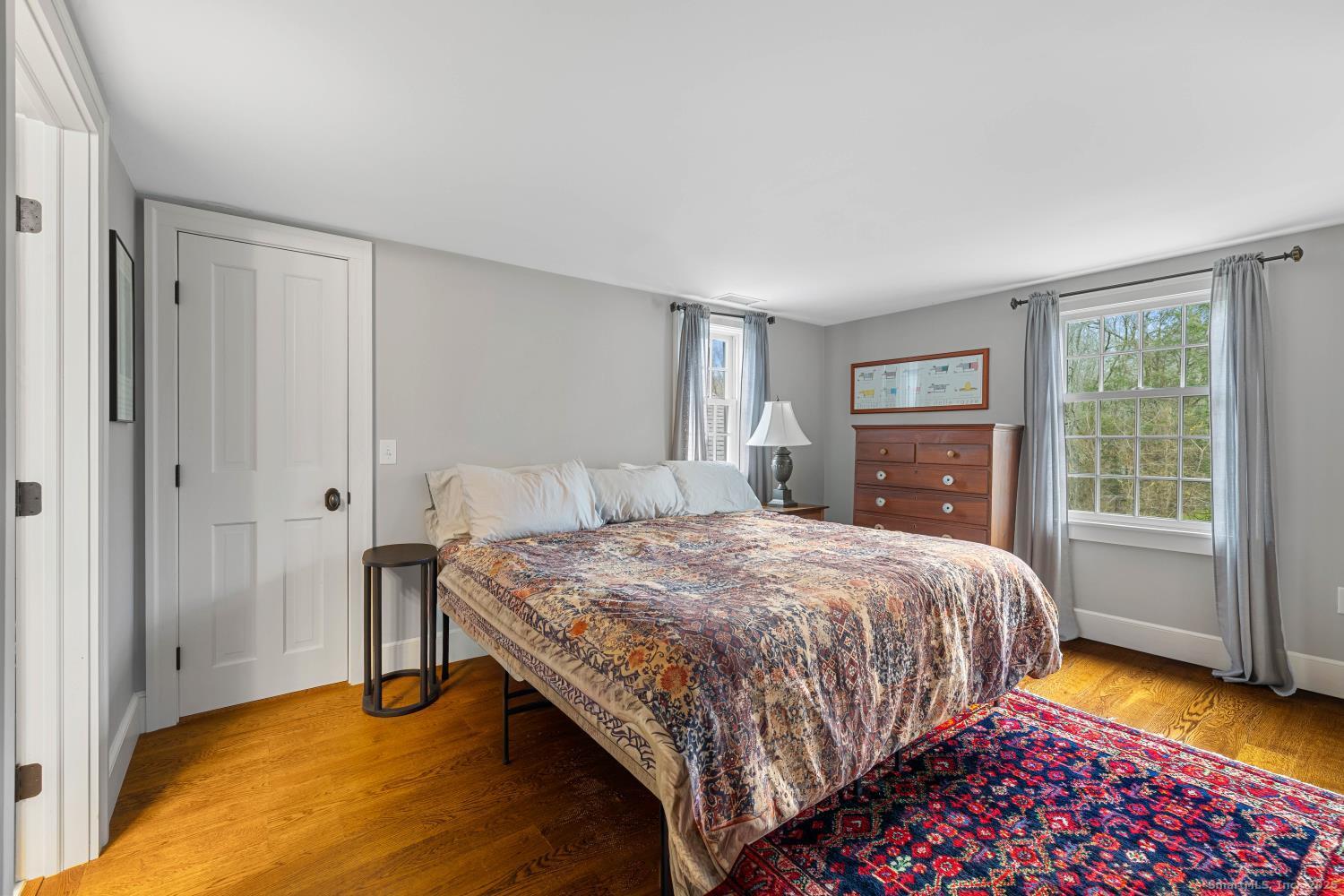 138 School House Road Old Saybrook, CT 06475 - Photo 33 of 40 a bedroom with a bed and a window