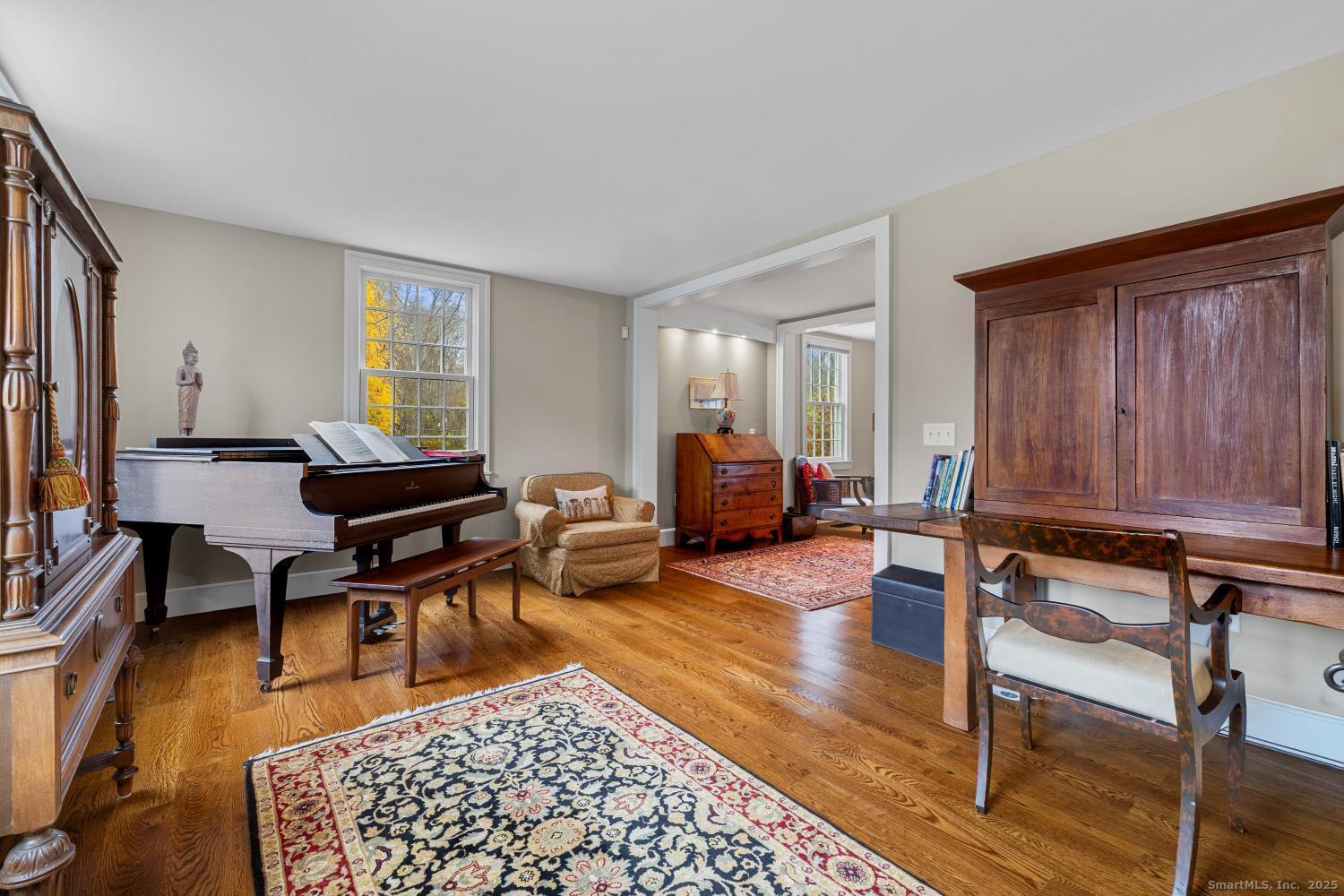 138 School House Road Old Saybrook, CT 06475 - Photo 8 of 40 a living room with furniture a rug and a window