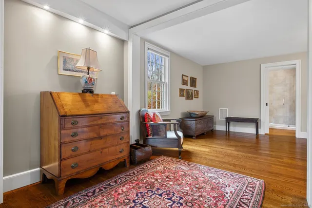 a living room with furniture and a table