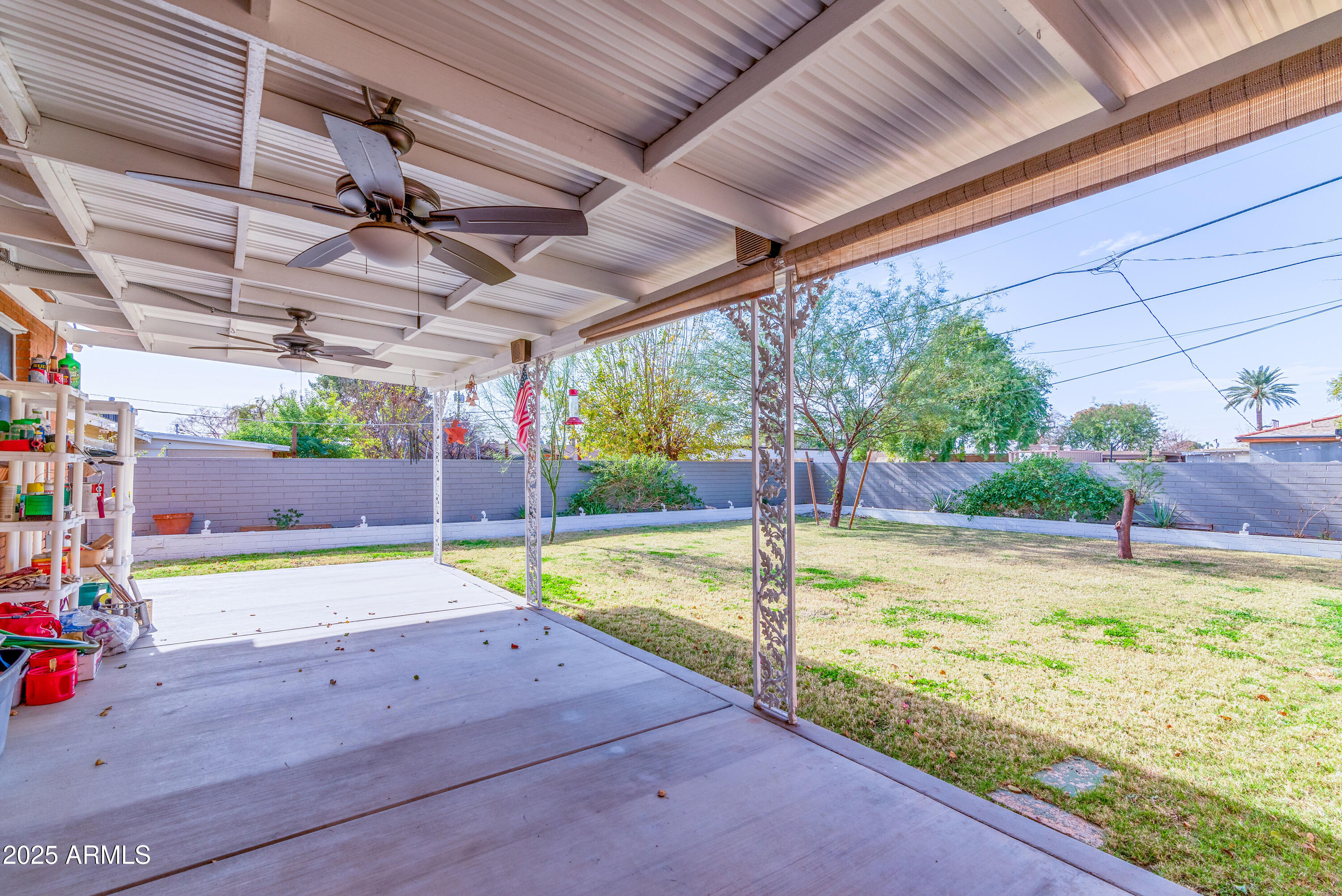 6850 North 15th Place Phoenix, AZ 85014 - Photo 21 of 26 a view of a backyard with swimming pool
