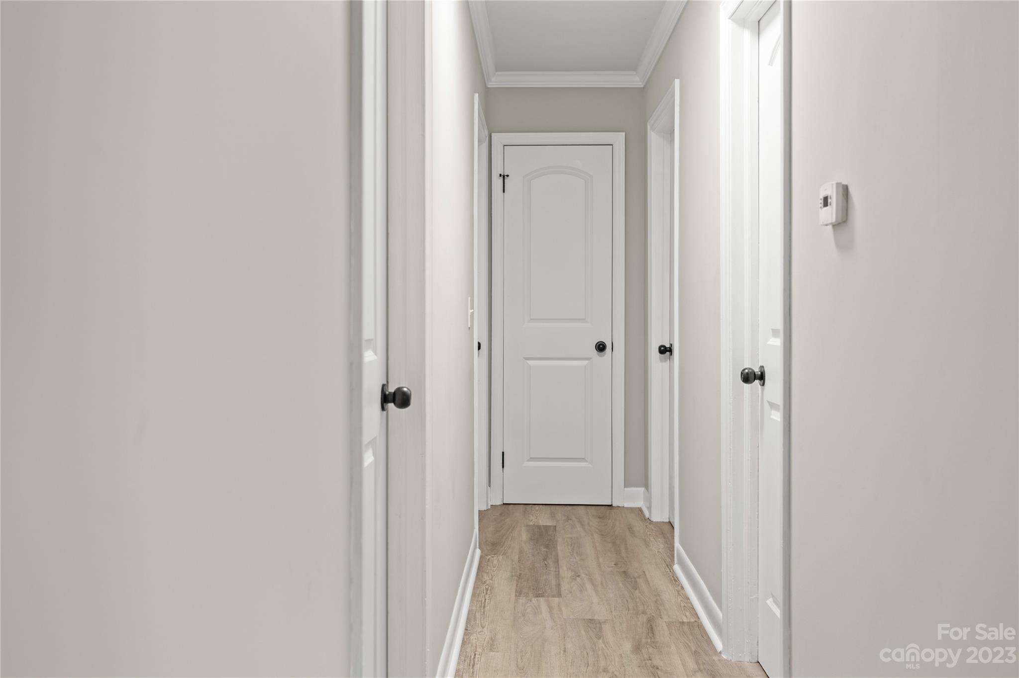 1415 East Main Street Cherryville, NC 28021 - Photo 11 of 34 a view of a hallway with wooden floor